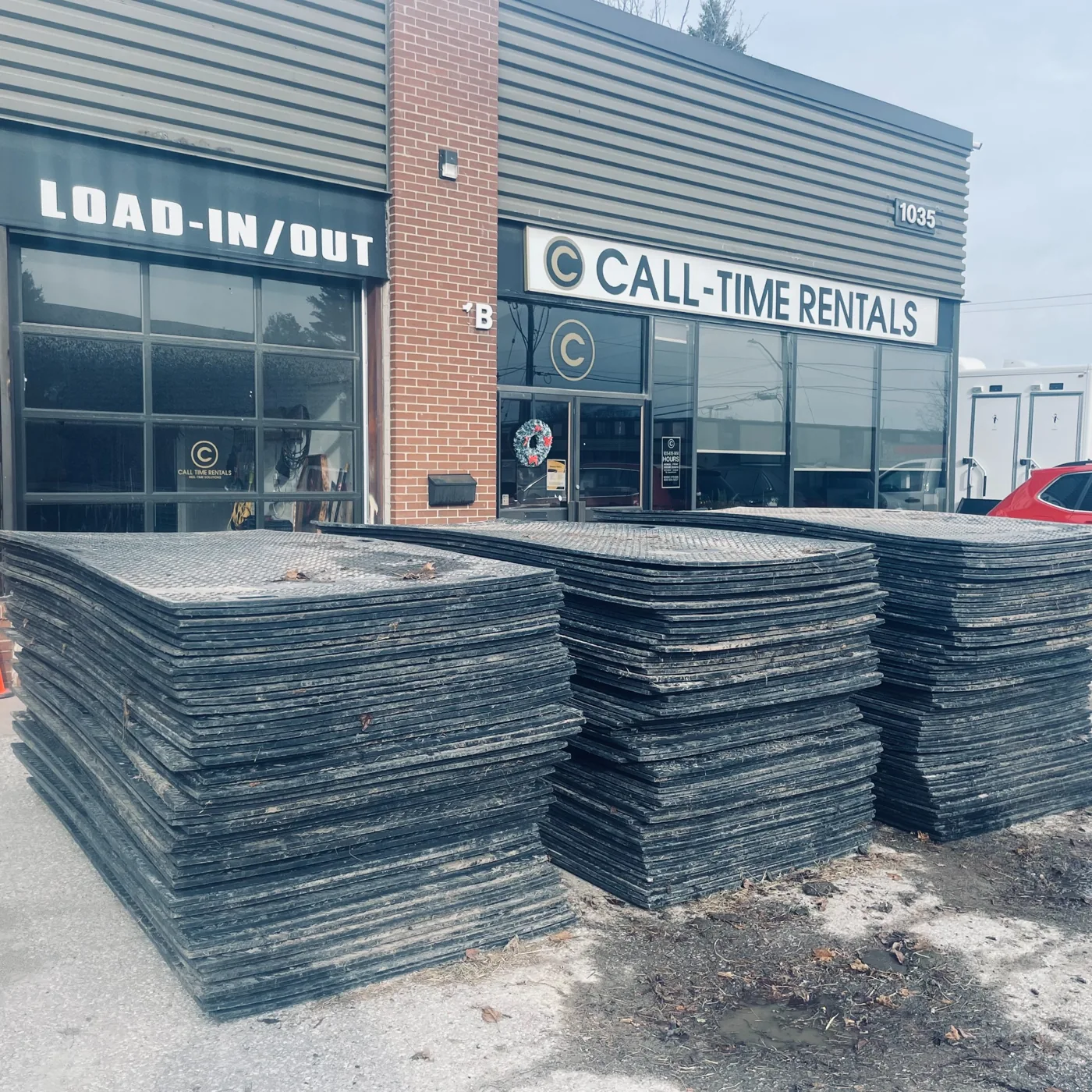 Trak Mat inventory outside Call Time Rentals facility